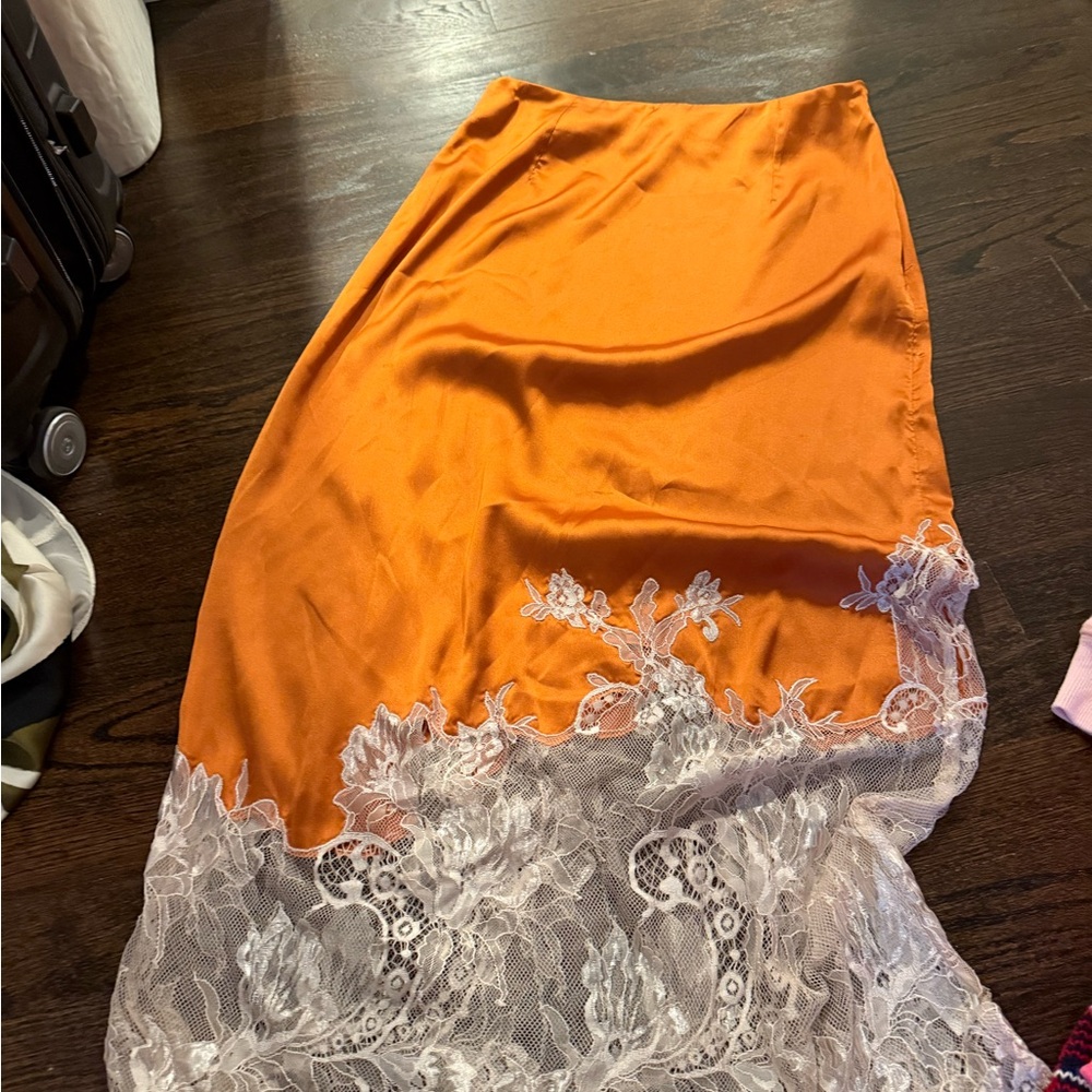 Orange Skirt with White Lace Overlay